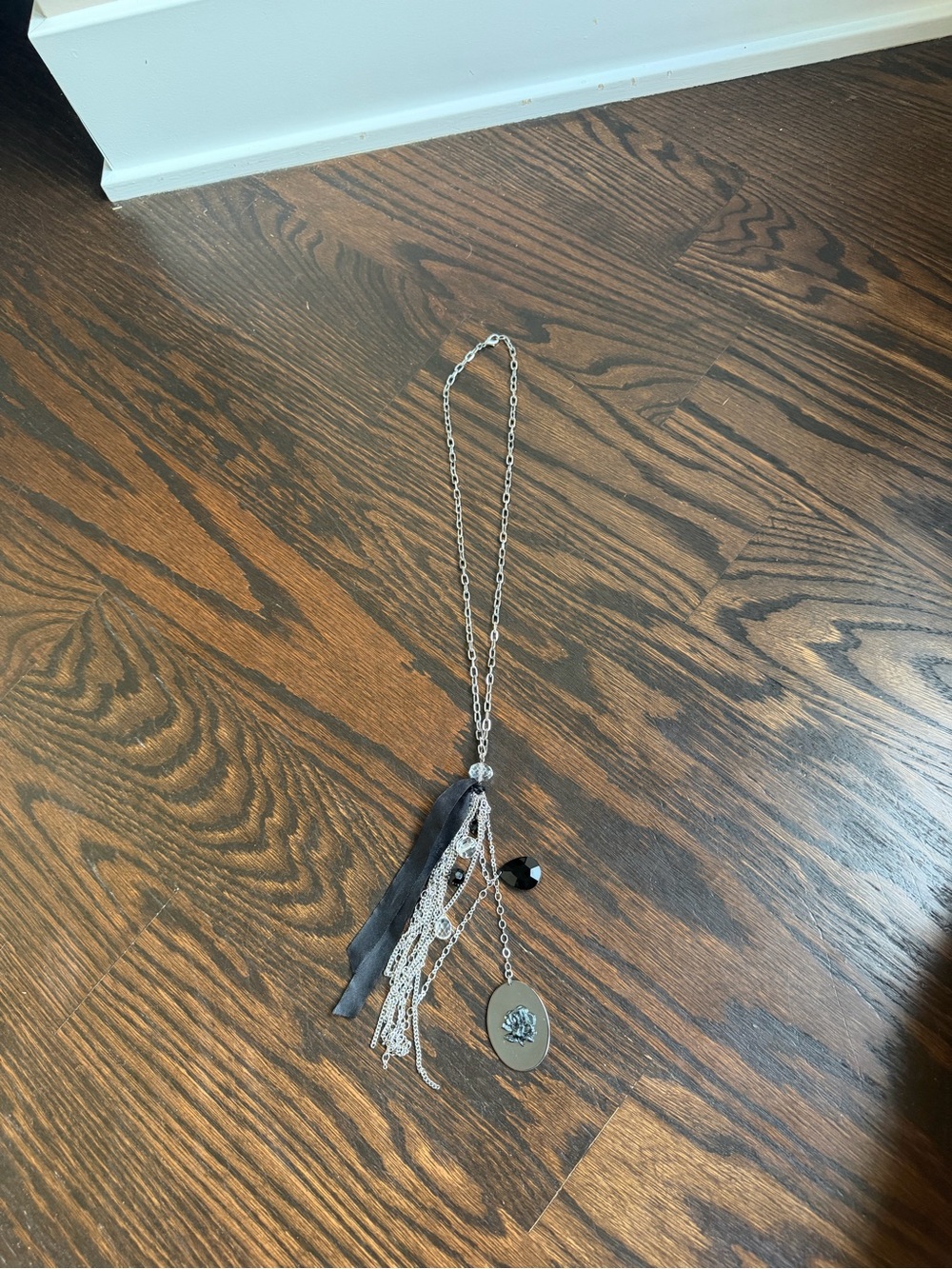 Silver-tone Tassel Pendant Necklace with Black ribbon Accent